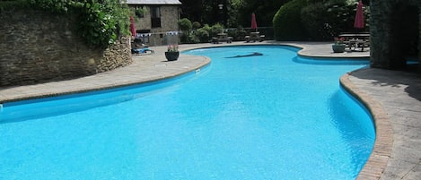 Outdoor heated pool open mid May to early September