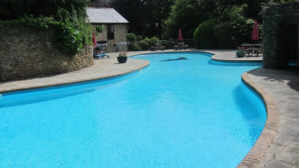 Outdoor heated pool open mid May to early September