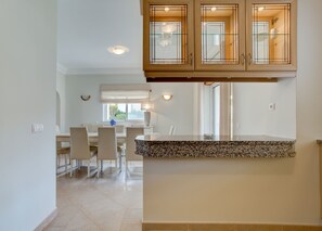Kitchen leading to dining area
