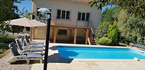 The sundeck has direct access to the pool.