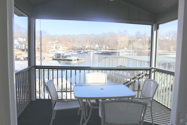 Screened Porch just off the dining room. Great spot for morning coffee! 