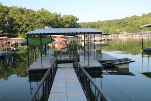 Access the private dock from the lower patio. Fish, swim, sun or boat easily.  