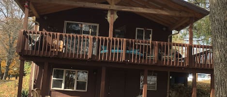 Covered deck overlooking the lake with view of Burnside Marina. 