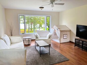 Large family room with view to lake. Great for movie nights, rainy days.