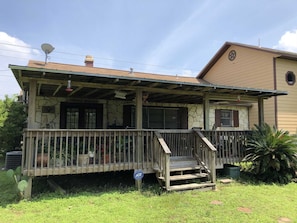 The back deck is nicely shaded, and even has a ceiling fan for stirring up a Hill Country breeze or two.