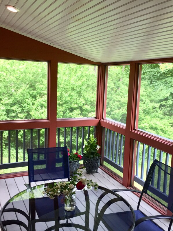 The Screened porch is among the zen spots in this beautiful home