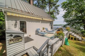 Front entrance and side deck with gas grill