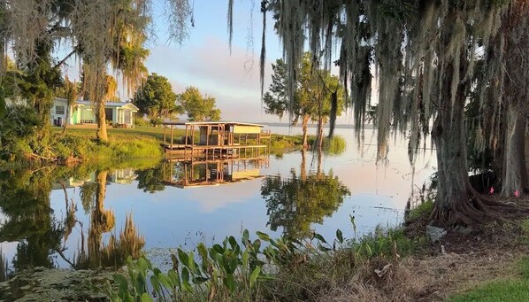 View from the backyard overlooking the canal into the lake. Great fishing btw!