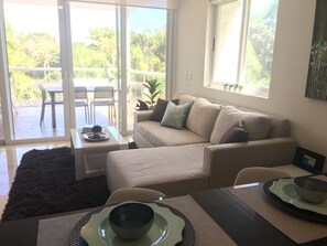 Open concept kithcen & living room continues through to the terrace.
