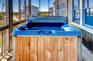 Sink into the 6-person hot tub on the mid-level deck for a soothing soak.