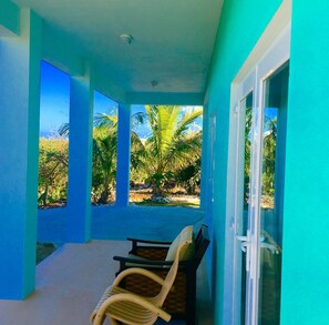 Studio porch looking toward the palm trees