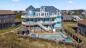 surf-or-sound-realty-737-tidal-treasure-drone-image-exterior-rear-view-close-up