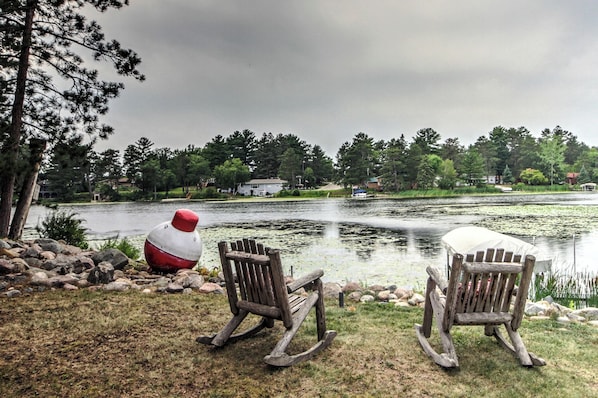 Rocking chairs facing the river