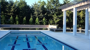 Pool tile, bench seating and pergola