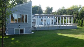 master bedroom and backyard view of pool deck