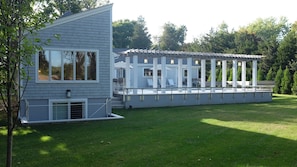 master bedroom and backyard view of pool deck