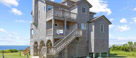 surf-or-sound-realty-124-stone-surf-exterior-left-side-view-front-of-home-edited