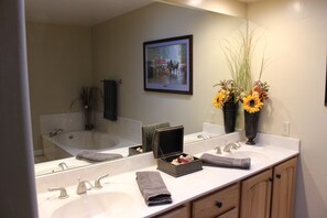 Master bathroom includes garden tub and separate shower.  