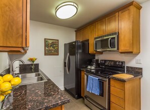 Full Kitchen with Kitchenware, Granite Counters & Stainless Appliances