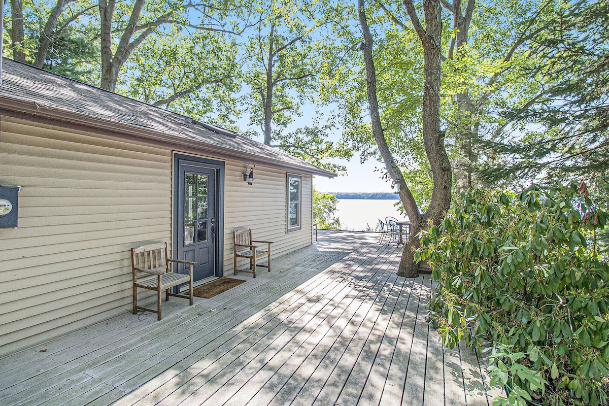 Cozy, lakefront cabin with gas grill and wrap-around deck.