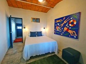The del Mar bedroom in our Playa Suite with queen size memory foam mattress.