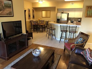 Fully equipped kitchen and dining room view from the living room