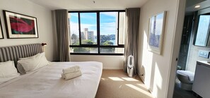 Main bedroom.  King sized bed.  Ensuite bathroom off bedroom. Built-in wardrobes