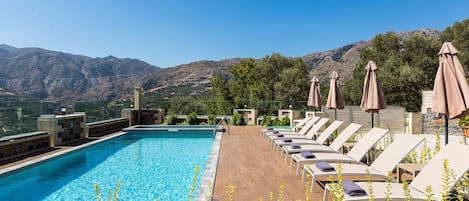 The pool terrace is equipped with sun beds and umbrellas!