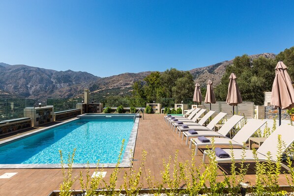 The pool terrace has sun beds and umbrellas for your comfort.