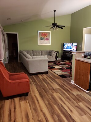 Open Living Area- New Vinyl flooring throughout