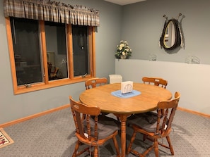 Open space dinning room.  Table has 2-leafs to expand for up to 6 people.