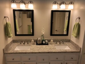 Dual sink vanity with raised counter tops