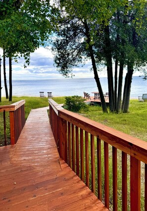 Stroll down to the lower deck which overlooks your private beach 