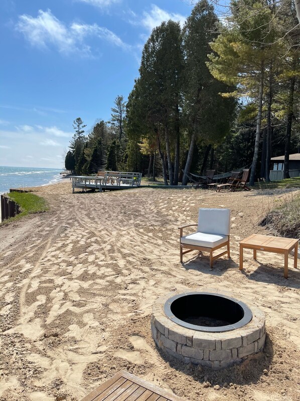 Enjoy the fire pit just off the side of the front deck