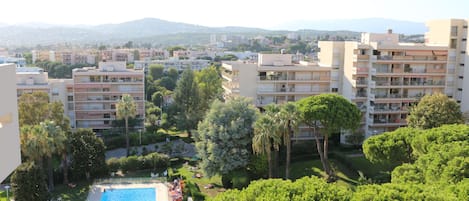 View of the pool and compound to the west from the bedroom