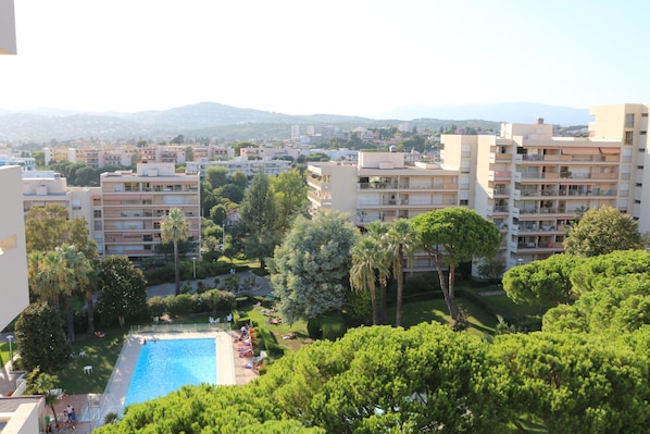 View of the pool and compound to the west from the bedroom