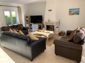Casa Bela - Leather sofas and flat screen TV  & Fire Place