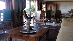 Open plan lounge & dining area leading out to the deck