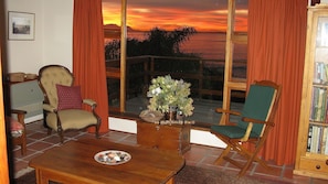 Sunsets over the bay looking towards Table Mt from the comfort of your couch