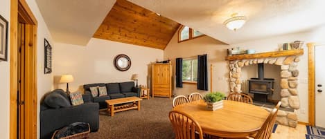 You'll love spending time in the large living area, with its vaulted ceilings and charming feel.