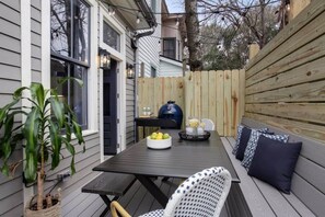 Private back deck with outdoor dining area