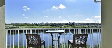 Living level balcony overlooking canal leading to bay