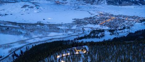 Driveway lights with the house on the ridge overlooking downtown Crested Butte