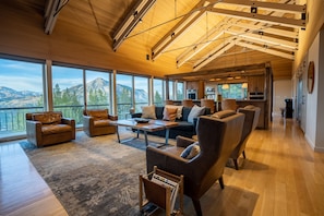 Open Floor Plan with 25 ft Ceilings and a wall of windows with AMAZING Views!