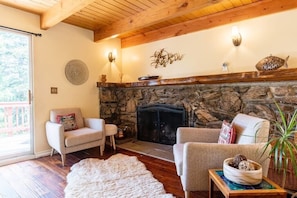Enjoy the views while relaxing by a roaring fire in the fireplace
