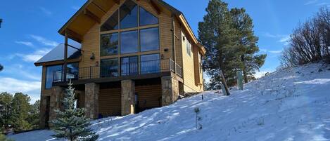 Luxurious cabin in winter - from sledding hill on north side