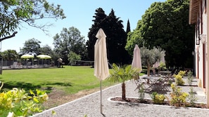 Each gite has its own outside area with table, chairs and  parasol facing south