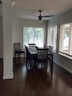 Dining Room w lake views. Seats 8; folding tables & chairs available.