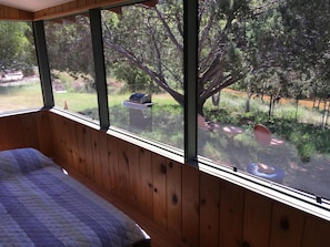 screened porch with barbecue grill outside for your use. 