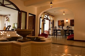 Villa Interior Courtyard with Fountain & Dining Area